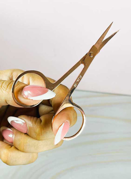 Tijeras para pestañas dorada