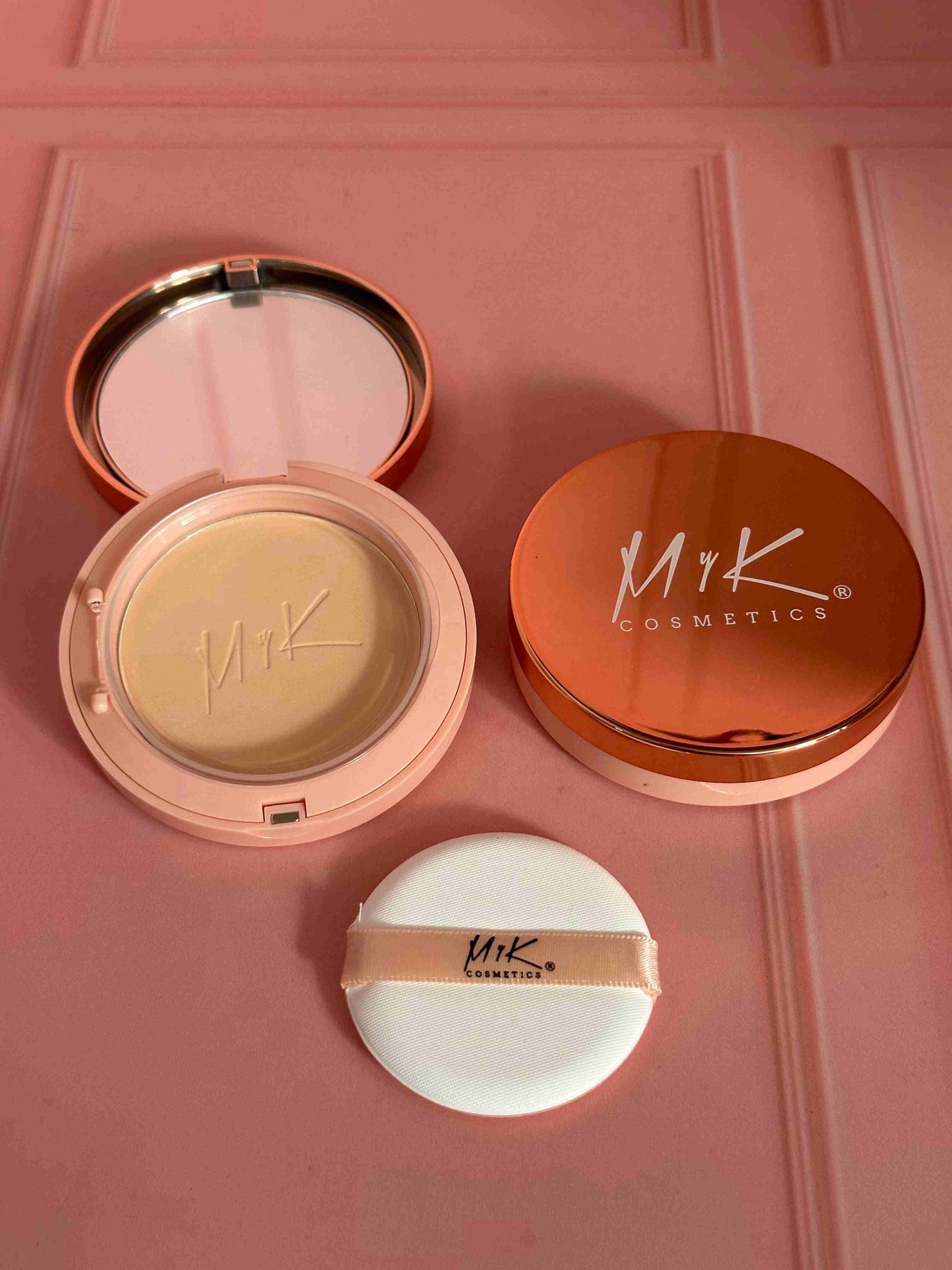 Polvo compacto con filtro solar MYK